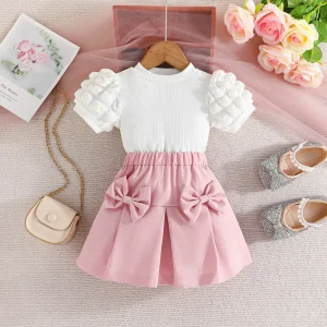 Girls puffed sleeve blouse and pink skirt with bows